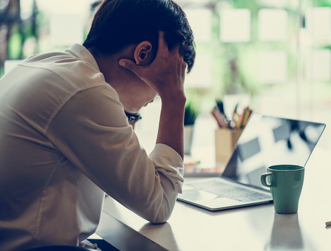 Confused businessman with stressed and worried about  working mistake and problems.